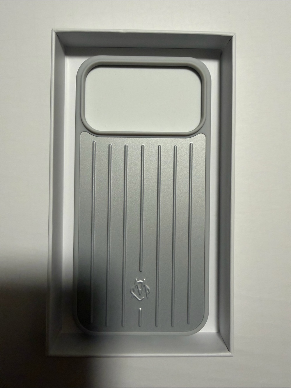 RIMOWA Metallic Silver Ribbed Phone Case